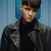 SAS: RED NOTICE GRACE LEWIS BLACK BIKER JACKET